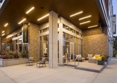 Patio area with firepit at front corner of hotel